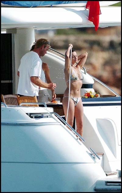 Penelope Cruz Showers in Bikini